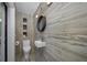 Modern powder room with floating vanity and stylish tile at 747 Brightwaters Ne Blvd, St Petersburg, FL 33704