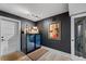 Sophisticated wine room with two wine coolers and dark walls at 747 Brightwaters Ne Blvd, St Petersburg, FL 33704