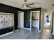 Primary bedroom with walk-in closet and access to another room at 8003 Bally Money Rd, Tampa, FL 33610