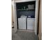 Laundry closet with washer and dryer at 8003 Bally Money Rd, Tampa, FL 33610