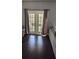 French doors open to a private patio area with outdoor seating at 8003 Bally Money Rd, Tampa, FL 33610