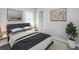 Serene bedroom provides a calming retreat with neutral tones and a peaceful ambiance at 8319 Swiss Chard Cir, Land O Lakes, FL 34637