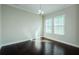 Light and bright bonus room with hardwood floors and ample natural light at 8319 Swiss Chard Cir, Land O Lakes, FL 34637