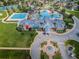 Community center with pool, tennis courts, and clubhouse at 8319 Swiss Chard Cir, Land O Lakes, FL 34637