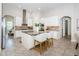 Bright open kitchen with a large island, granite counters, and modern appliances at 8319 Swiss Chard Cir, Land O Lakes, FL 34637