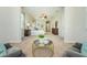 Spacious main bedroom features plush carpet, an ensuite bathroom and seating area for ultimate relaxation at 8319 Swiss Chard Cir, Land O Lakes, FL 34637