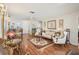 Elegant living room with hardwood floors and ornate furniture at 9302 Trowbridge Ct, New Port Richey, FL 34655