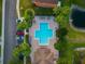 Aerial view of community pool and surrounding area with parking at 10817 Great Carlisle Ct, Riverview, FL 33578
