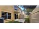 Townhouse exterior with a private back patio and sliding glass door access at 10817 Great Carlisle Ct, Riverview, FL 33578