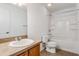 Bathroom featuring a single vanity, toilet, and a shower-tub combo with tile floors at 10817 Great Carlisle Ct, Riverview, FL 33578
