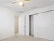 Bright bedroom features carpeted floors and a double door closet at 10817 Great Carlisle Ct, Riverview, FL 33578