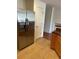 Modern kitchen with stainless steel refrigerator, tile floor, and pantry at 10817 Great Carlisle Ct, Riverview, FL 33578