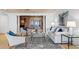 Spacious living room featuring a brick fireplace, comfortable seating, and an inviting open layout at 1131 Snell Isle Ne Blvd, St Petersburg, FL 33704