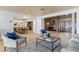 Open concept living room with a dining area, brick fireplace, and seamless flow to other spaces at 1131 Snell Isle Ne Blvd, St Petersburg, FL 33704