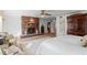 Expansive bedroom with a brick fireplace, comfortable seating area, and luxurious furnishings at 1131 Snell Isle Ne Blvd, St Petersburg, FL 33704