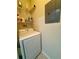 Laundry area includes a washer, dryer, and additional shelving at 1216 S Missouri Ave # 308, Clearwater, FL 33756