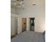 Bright bedroom with access to bathroom and closets at 1252 Costa Mesa Dr, Wesley Chapel, FL 33543