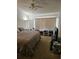Spacious bedroom with large window and ceiling fan at 1252 Costa Mesa Dr, Wesley Chapel, FL 33543