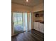 Laundry room with washer, dryer, and access to backyard at 1252 Costa Mesa Dr, Wesley Chapel, FL 33543
