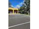 Parking lot with handicap accessible spots and mailboxes at 1252 Costa Mesa Dr, Wesley Chapel, FL 33543