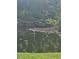 Serene pond with lush greenery and a heron at 1252 Costa Mesa Dr, Wesley Chapel, FL 33543
