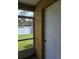 Screened patio with exterior storage at 1252 Costa Mesa Dr, Wesley Chapel, FL 33543