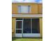 Screened patio with access to backyard at 1252 Costa Mesa Dr, Wesley Chapel, FL 33543