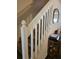 Indoor staircase with white railing and carpeted steps at 1252 Costa Mesa Dr, Wesley Chapel, FL 33543
