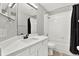Clean bathroom with white vanity and bathtub at 12612 Midpointe Dr, Riverview, FL 33579