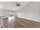 Living room with sliding glass doors to the patio at 12612 Midpointe Dr, Riverview, FL 33579
