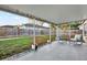 Relaxing screened patio with seating area and backyard view at 12612 Midpointe Dr, Riverview, FL 33579