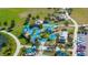 Aerial view of community playground with play structures at 13608 S Village Dr # 6203, Tampa, FL 33618