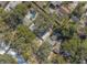 Aerial view showing house and surrounding trees at 1428 Illinois Ave, Palm Harbor, FL 34683