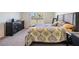 Main bedroom with large bed, dresser, and window at 16838 Delia St, Wimauma, FL 33598