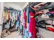 Large walk-in closet with double hanging rods and shelving at 16838 Delia St, Wimauma, FL 33598