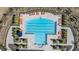 Resort-style pool with multiple lounge chairs at 16838 Delia St, Wimauma, FL 33598