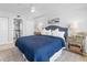 Comfortable bedroom with ensuite bathroom and ocean view at 20002 Gulf Blvd # 2602, Indian Shores, FL 33785