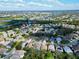 Aerial view of a large suburban neighborhood with many houses at 2012 Fern Ridge Ct, Holiday, FL 34691