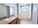 Clean bathroom with a bathtub and granite countertop at 2012 Fern Ridge Ct, Holiday, FL 34691