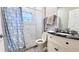 Clean bathroom with a shower/tub combo and vanity at 2012 Fern Ridge Ct, Holiday, FL 34691