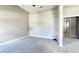 Large bedroom with neutral walls, carpet flooring and an ensuite bathroom at 2012 Fern Ridge Ct, Holiday, FL 34691