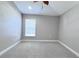 Well-lit bedroom with neutral walls and carpet flooring at 2012 Fern Ridge Ct, Holiday, FL 34691
