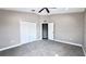Spacious bedroom with neutral walls and carpet flooring at 2012 Fern Ridge Ct, Holiday, FL 34691