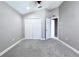 Spacious bedroom with neutral walls and carpet flooring at 2012 Fern Ridge Ct, Holiday, FL 34691