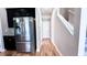 Bright hallway with wood flooring leading to other rooms at 2012 Fern Ridge Ct, Holiday, FL 34691