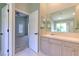 Bathroom with vanity, and view into the Primary bedroom at 3125 Bent Creek Dr, Valrico, FL 33596