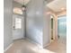 Bright entryway with tile flooring and access to bathroom at 3125 Bent Creek Dr, Valrico, FL 33596