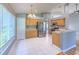 Kitchen boasts stainless steel appliances and wood cabinets at 3125 Bent Creek Dr, Valrico, FL 33596