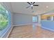 Living area with hardwood floors and kitchen views at 3125 Bent Creek Dr, Valrico, FL 33596