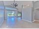 Living room with sliding doors leading to the patio at 3125 Bent Creek Dr, Valrico, FL 33596